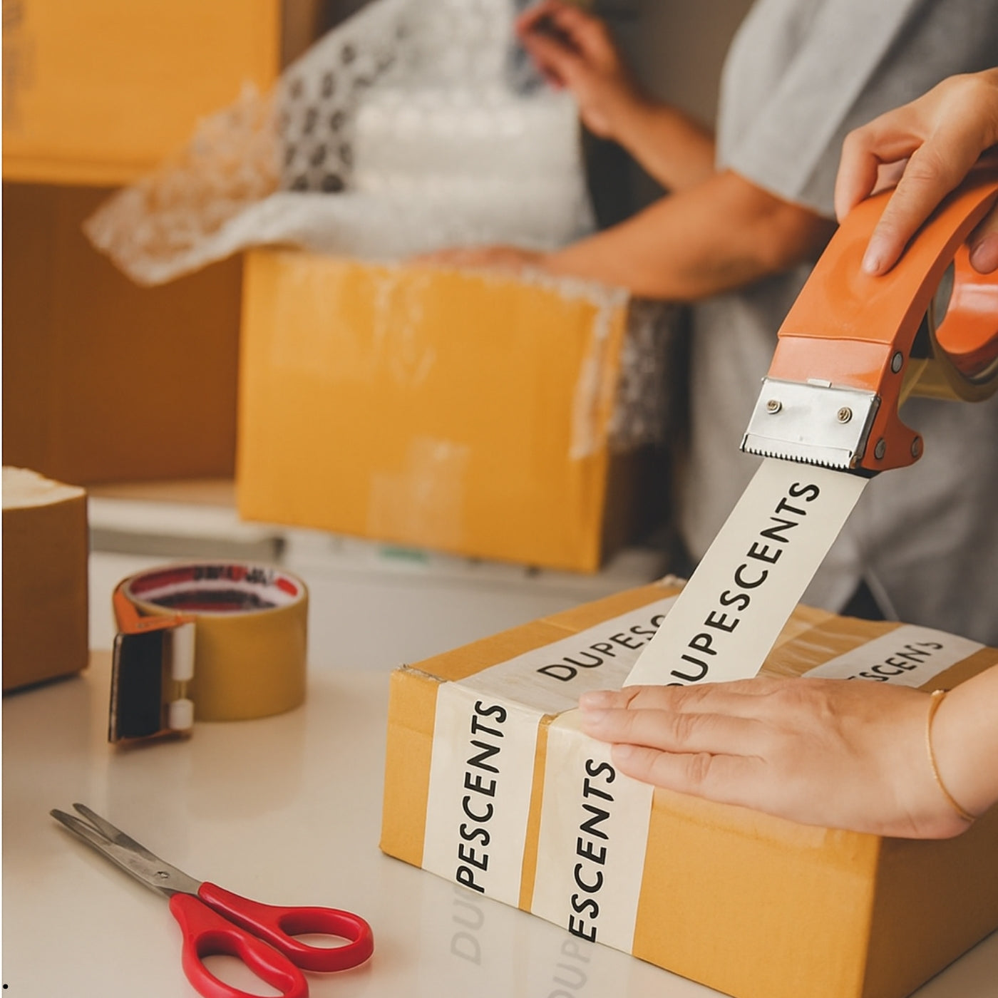 Packtejp med logotyp av dupescents