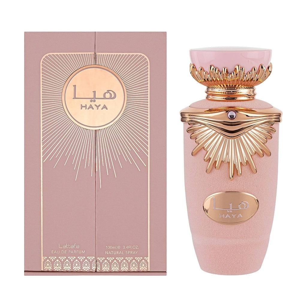 Lattafa Haya damparfym med elegant rosa och guldfärgad flaska och matchande förpackning