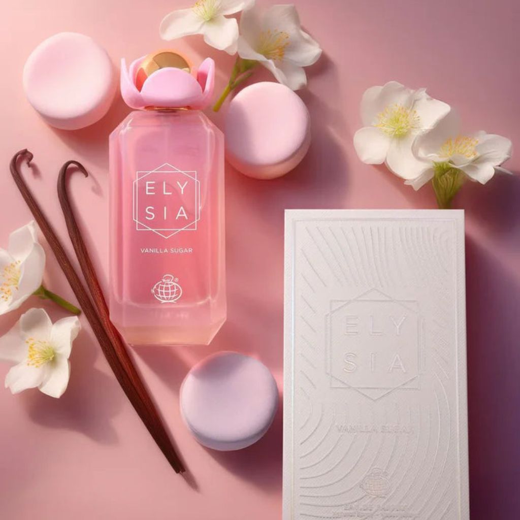 Elysia Vanilla Sugar damparfym flaska i rosa med vit förpackning och dekorativa blommor och macaroner