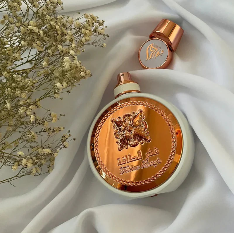 Fakhar Woman damparfym från Givenchy L'interdit med elegant design och roséguld detaljer
