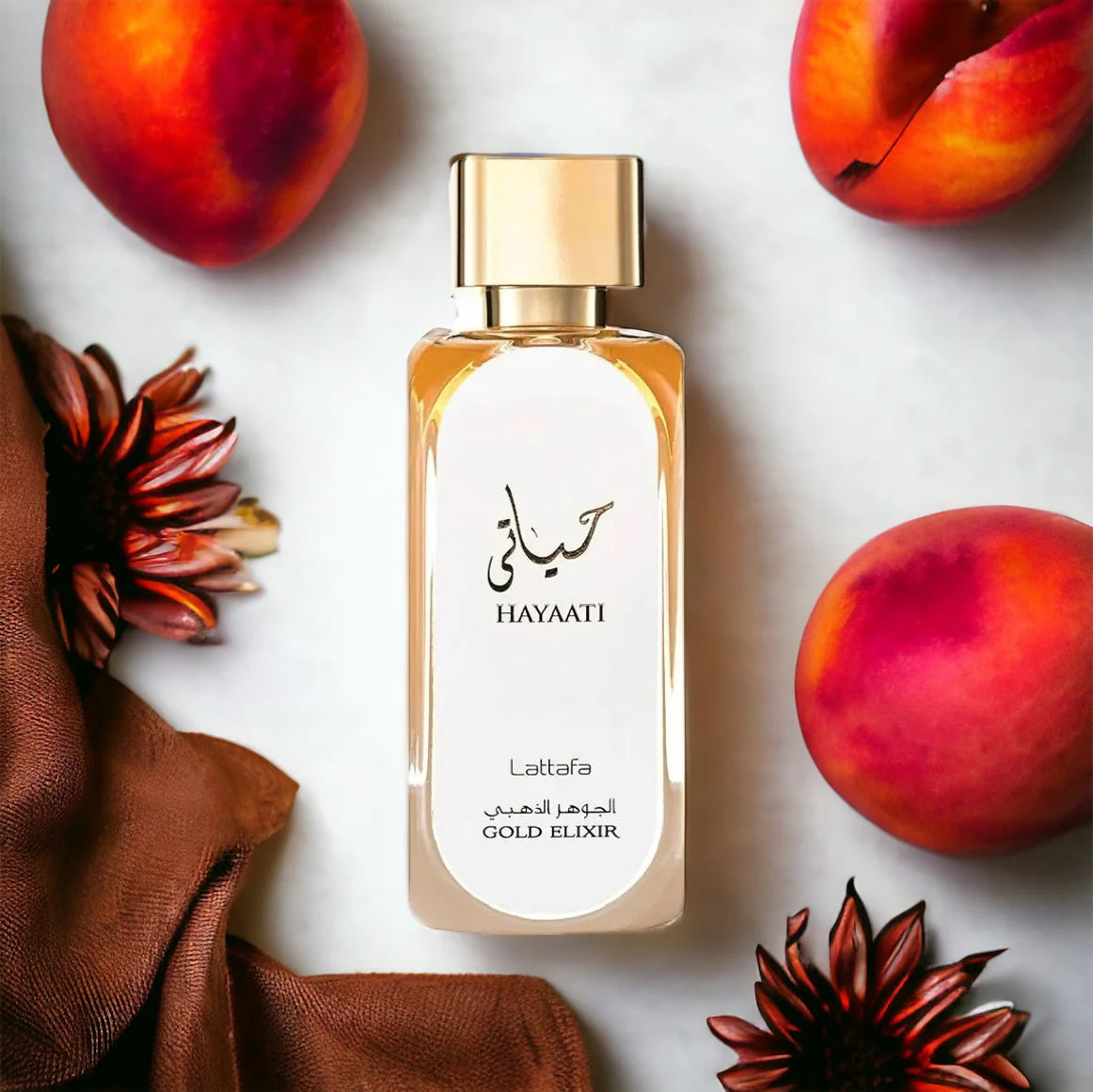 Hayaati Gold Elixir parfymflaska från Lattafa Creation med blommiga och fruktiga noter