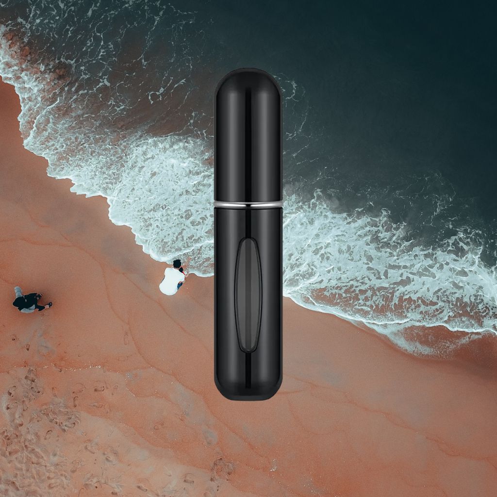 Svart unisex parfymflaska för Parfym Travel size 5ML med oceanvåg i bakgrunden